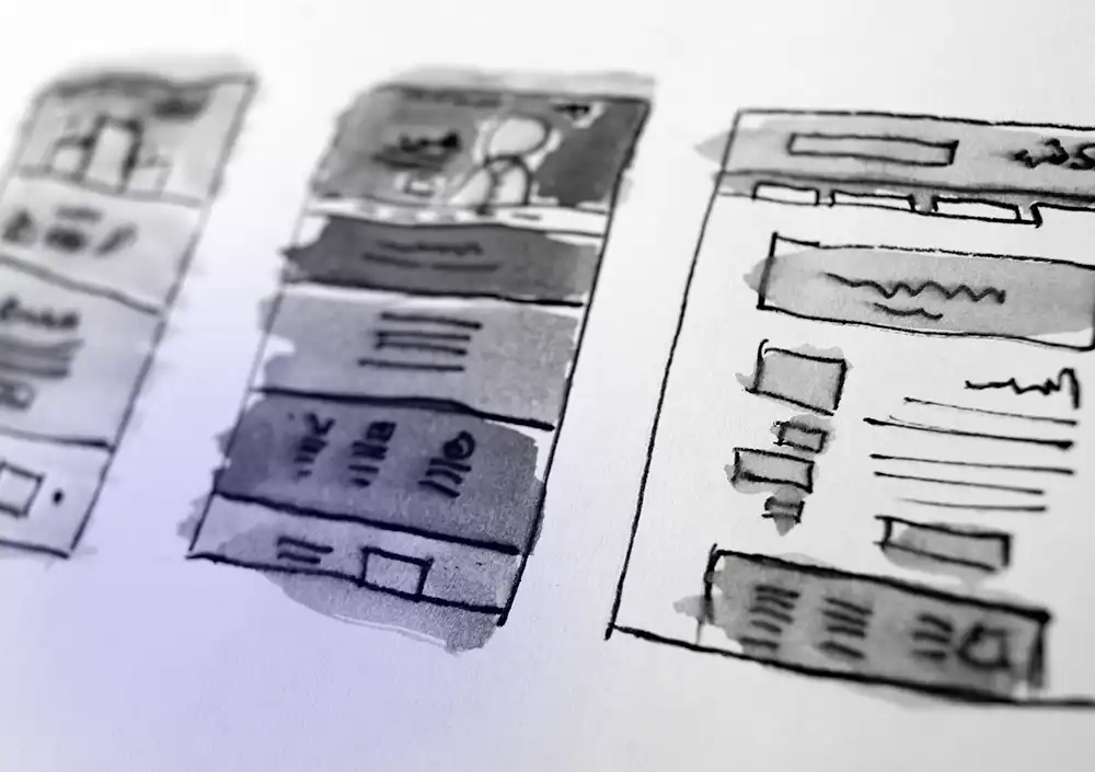 Wireframes drawn on paper